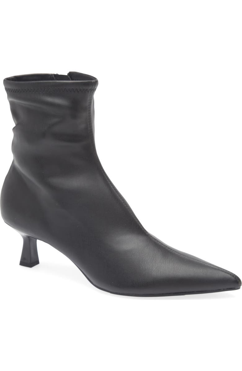 15 Outfits to Put on With Your Black Ankle Boots