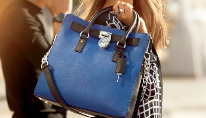 Why Do Many Ladies Desire Black Over Blue Purses?